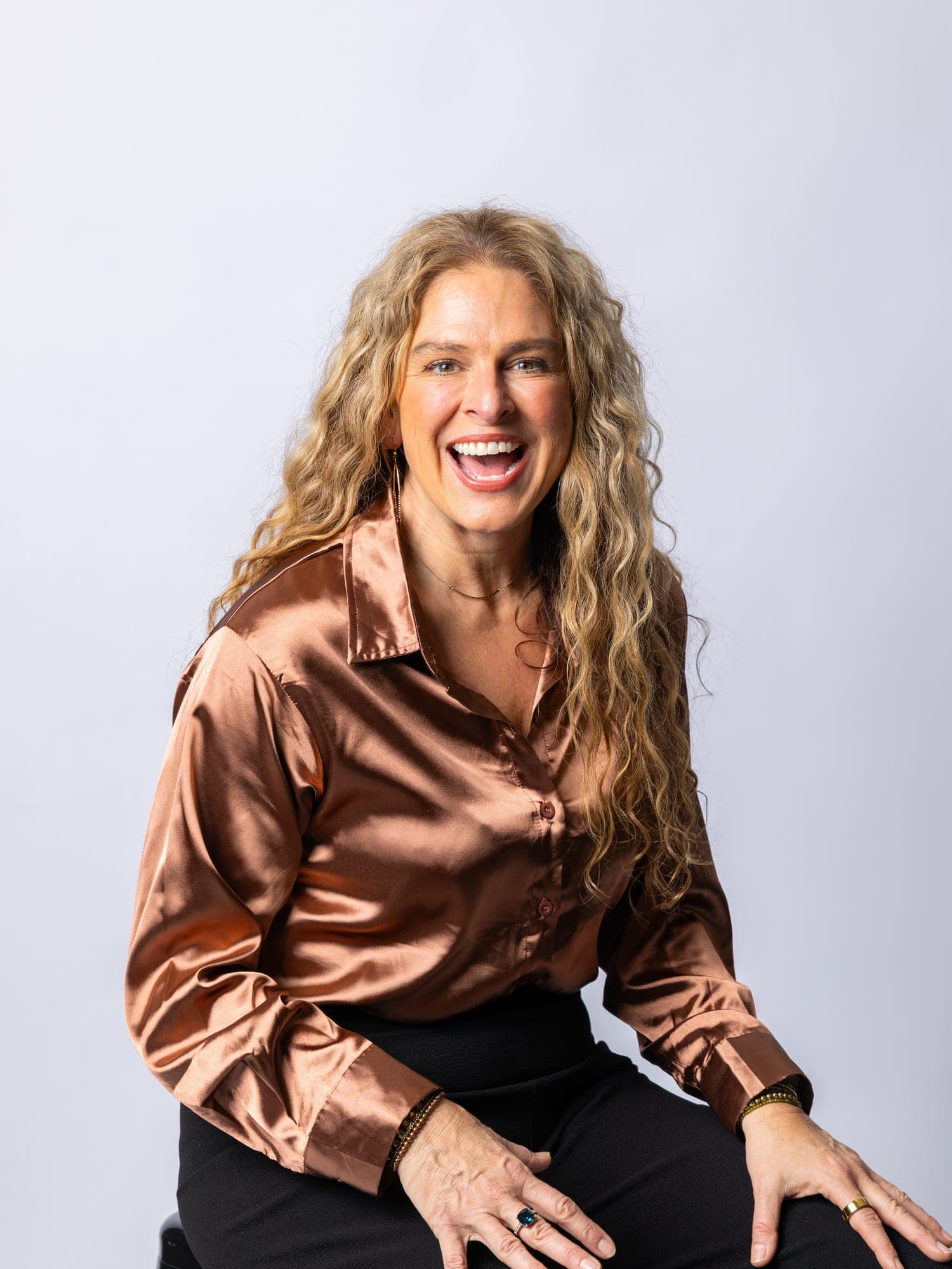 Dr Rebecca Chabot, seated studio portrait